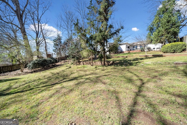 view of yard featuring fence