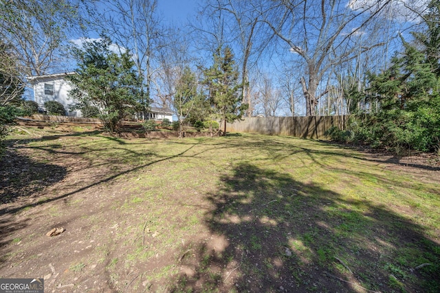 view of yard featuring fence