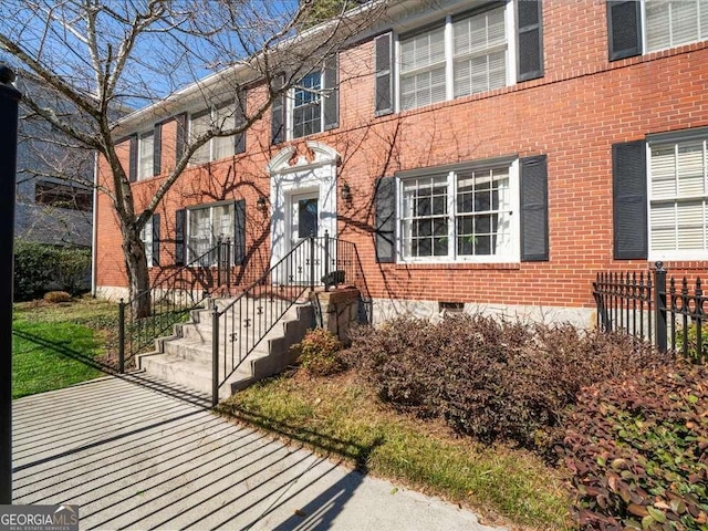 view of front of property with brick siding