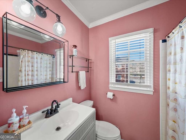 bathroom featuring toilet, curtained shower, ornamental molding, and vanity