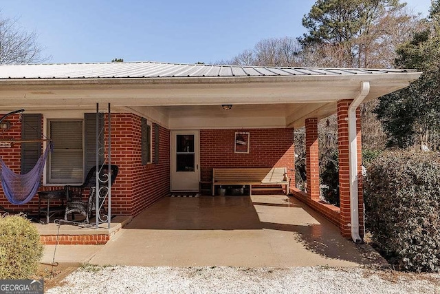 view of patio featuring a carport