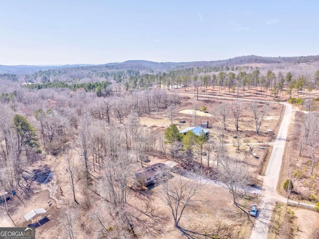 aerial view featuring a mountain view and a rural view