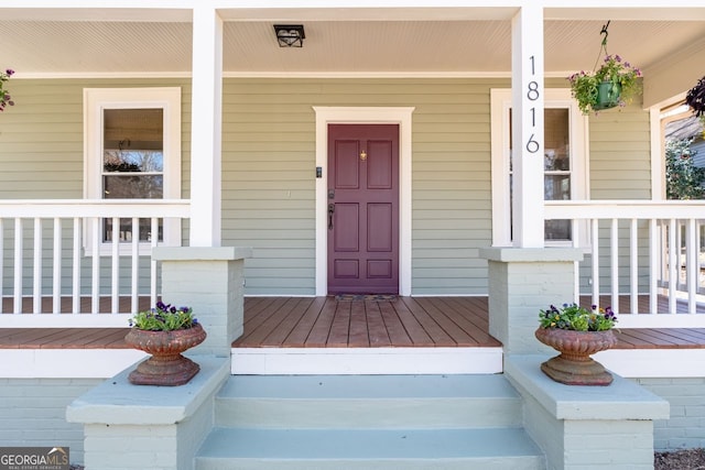 entrance to property with covered porch