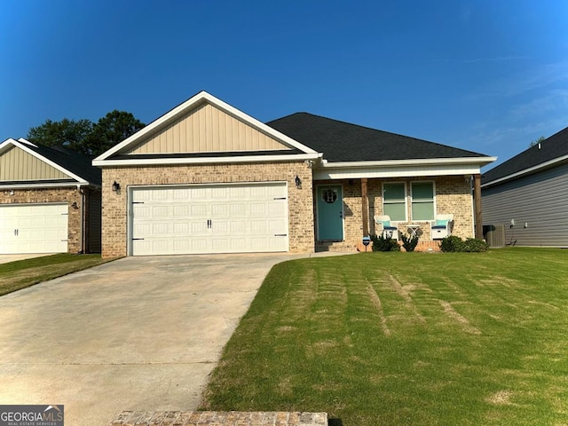 ranch-style home with an attached garage, cooling unit, brick siding, driveway, and a front yard