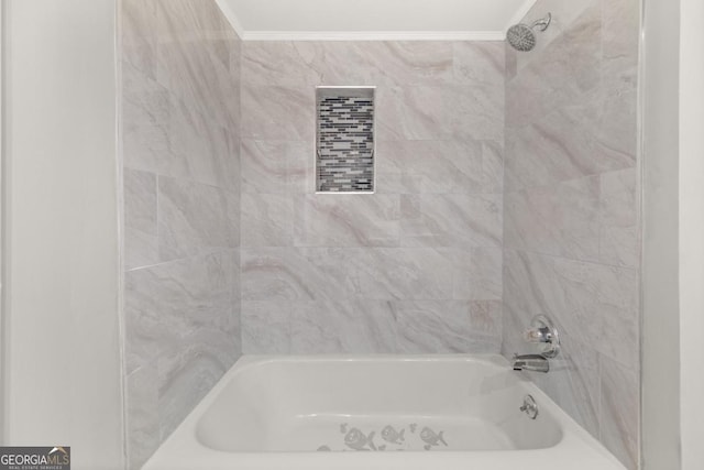 full bath featuring ornamental molding and bathtub / shower combination