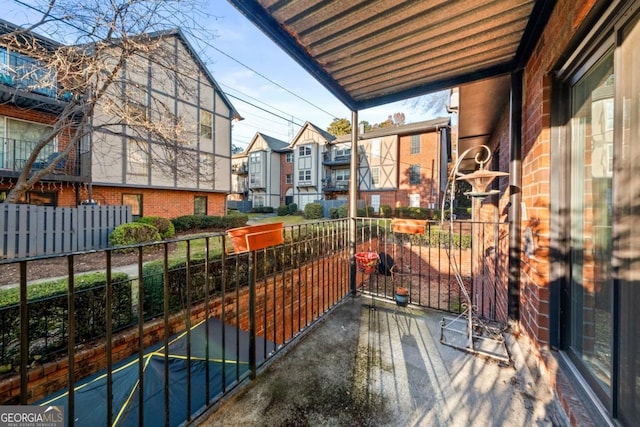 balcony featuring a residential view