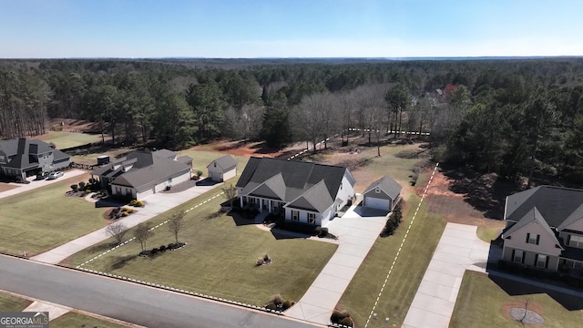 bird's eye view with a forest view