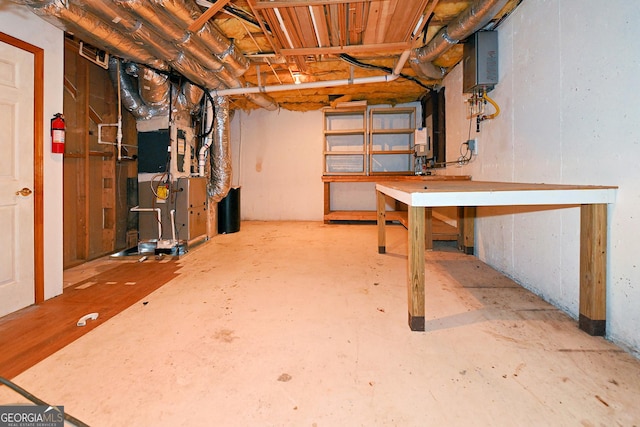 unfinished basement with heating unit