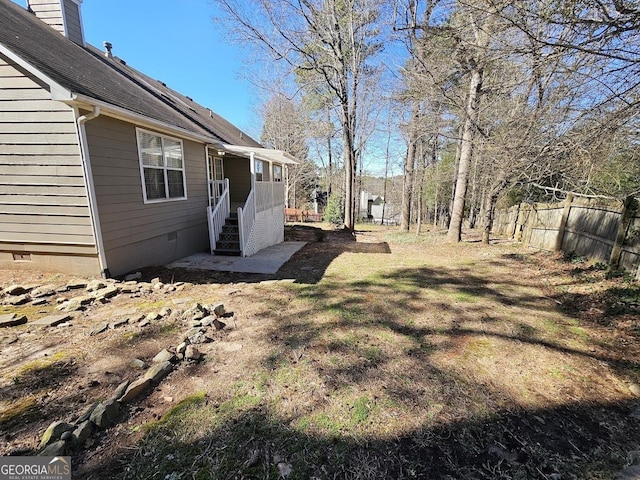 view of yard featuring fence