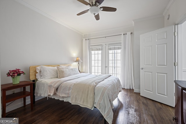 bedroom with access to outside, dark wood finished floors, crown molding, and french doors