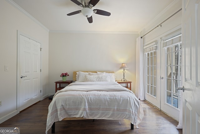 bedroom featuring ornamental molding, wood finished floors, and access to exterior