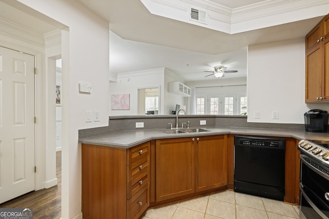 kitchen with black dishwasher, electric range, visible vents, brown cabinetry, and a sink