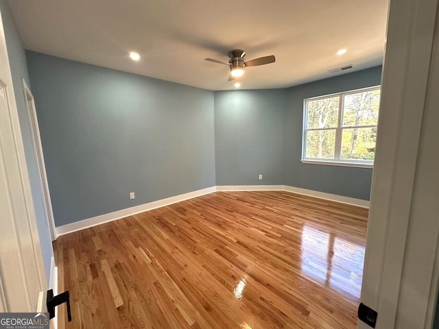 interior space with recessed lighting, visible vents, light wood-style floors, ceiling fan, and baseboards