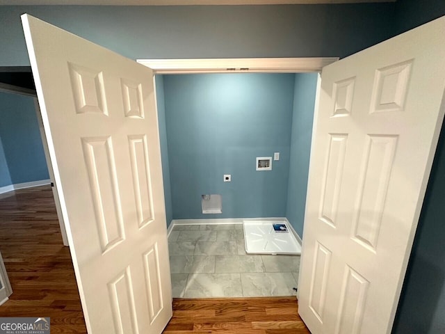 laundry room with washer hookup, laundry area, electric dryer hookup, and baseboards