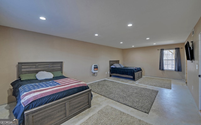 bedroom featuring concrete flooring, baseboards, visible vents, and recessed lighting