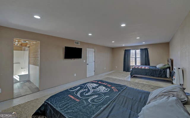 bedroom with visible vents and recessed lighting