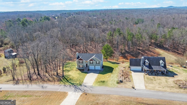 aerial view featuring a forest view