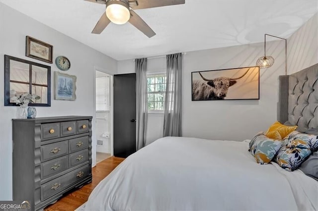 bedroom featuring ceiling fan and wood finished floors