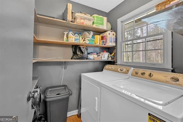 laundry area featuring laundry area and separate washer and dryer