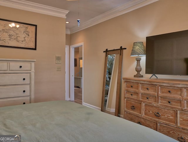 bedroom with baseboards and crown molding