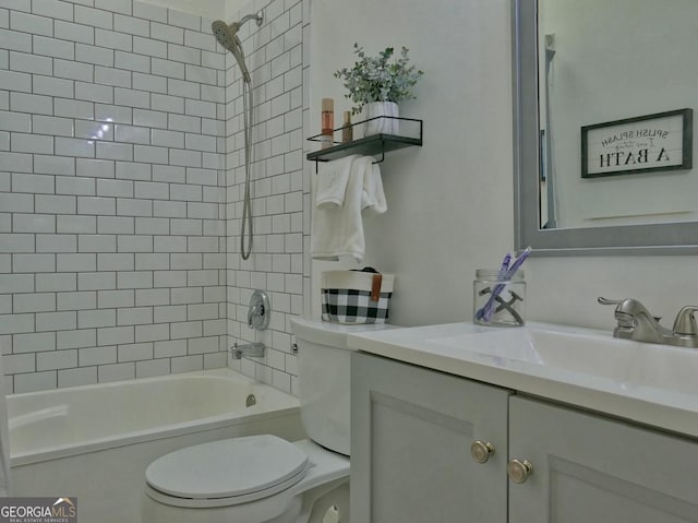 bathroom with toilet, shower / bath combination, and vanity