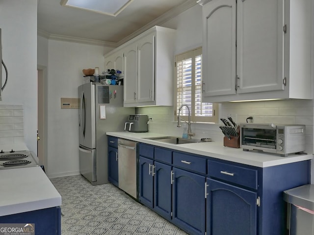 kitchen featuring blue cabinetry, appliances with stainless steel finishes, white cabinetry, and light countertops