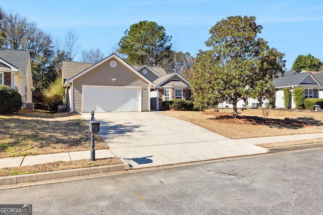 ranch-style house featuring driveway and an attached garage