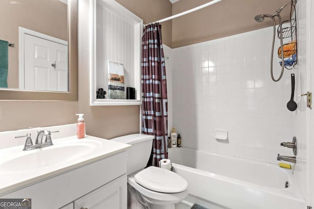 full bathroom featuring toilet, shower / bath combination with curtain, and vanity