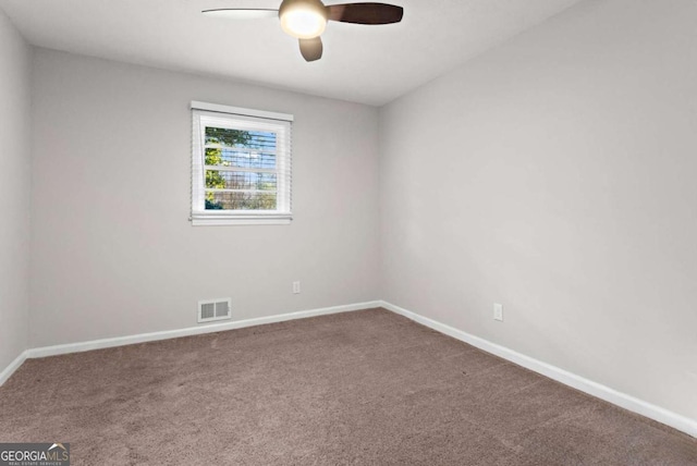 unfurnished room with a ceiling fan, baseboards, visible vents, and carpet flooring