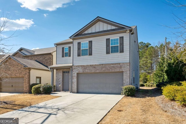 view of front of property featuring a garage, concrete driveway, board and batten siding, and brick siding