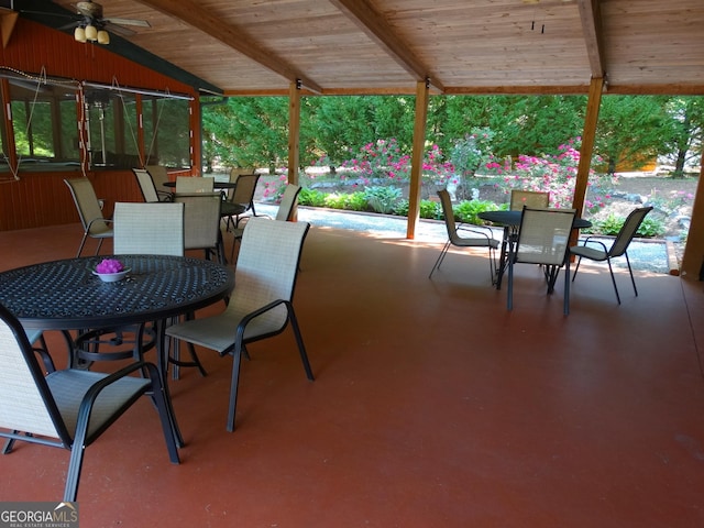 view of patio / terrace with a ceiling fan and outdoor dining space