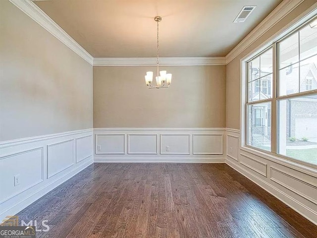 interior space featuring an inviting chandelier, crown molding, visible vents, and dark wood-type flooring