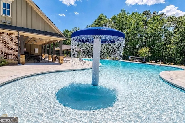 pool with a patio