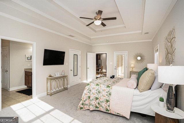 bedroom with light carpet, visible vents, baseboards, a tray ceiling, and crown molding