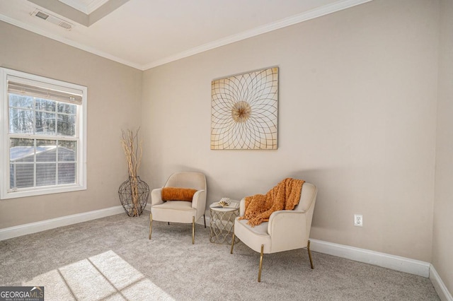 living area featuring ornamental molding, visible vents, carpet floors, and baseboards