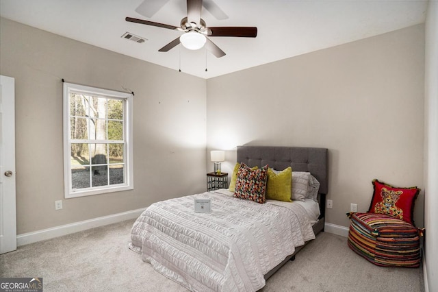 bedroom featuring carpet floors, visible vents, ceiling fan, and baseboards