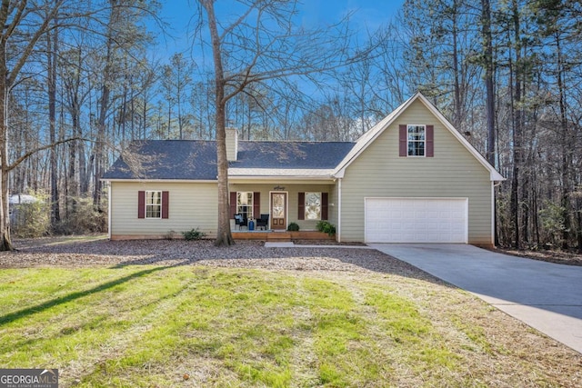 view of front facade with a chimney, a porch, an attached garage, driveway, and a front lawn