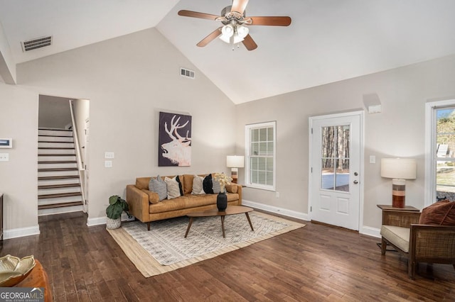 living area featuring visible vents, ceiling fan, stairway, and hardwood / wood-style floors