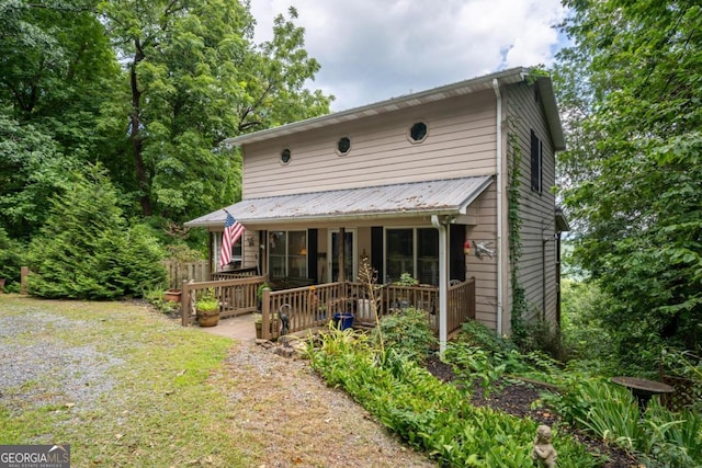 view of front of property with metal roof