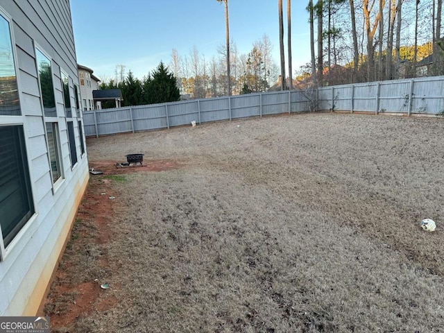 view of yard featuring a fenced backyard