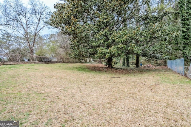 view of yard featuring fence