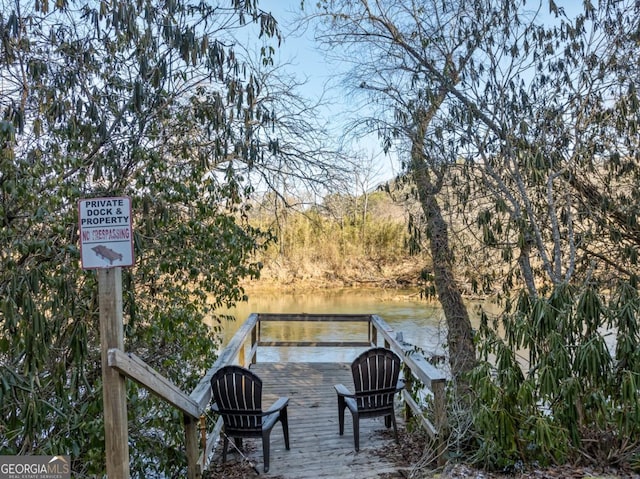 view of dock featuring a water view