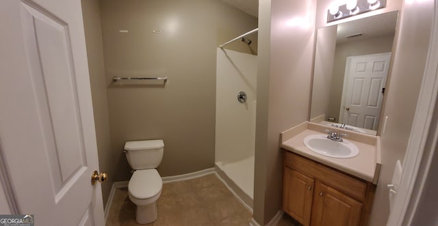 full bath with toilet, vanity, walk in shower, baseboards, and tile patterned floors