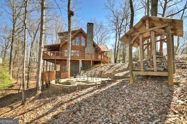 view of yard with a wooden deck