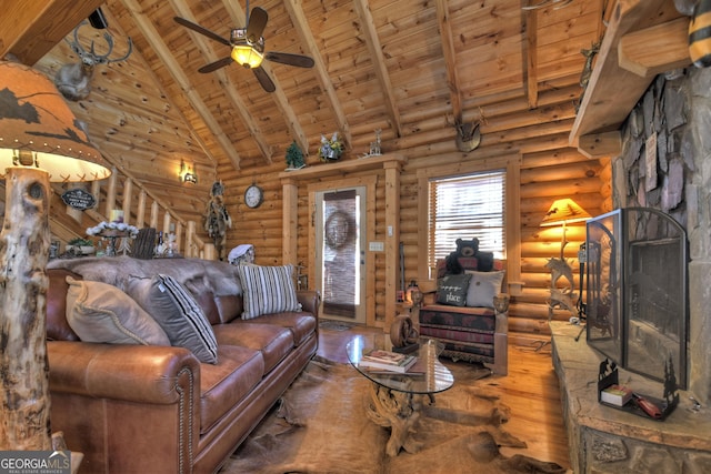 381 Morley Ct, Ellijay, GA 30540 - living room with a wooden ceiling with exposed beams, wood finished floors, a ceiling fan, log walls, and high vaulted ceiling