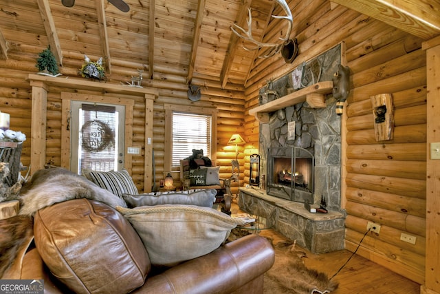 381 Morley Ct, Ellijay, GA 30540 - living area with wooden ceiling, wood finished floors, a stone fireplace, and log walls