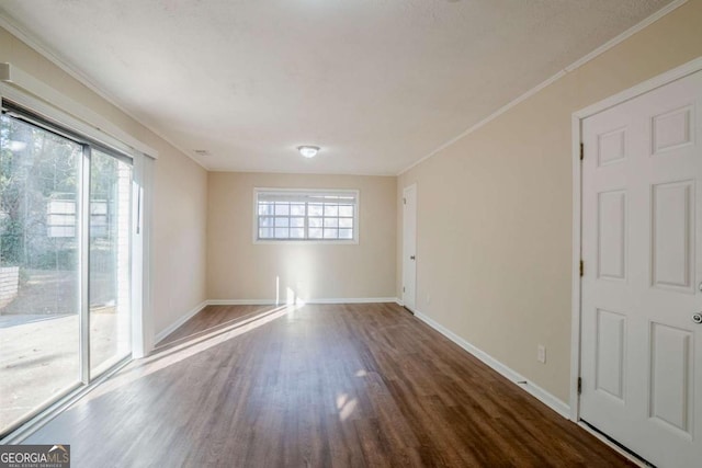 2236 Chestnut Hill Cir, Decatur, GA 30032 - empty room with crown molding, wood finished floors, and baseboards