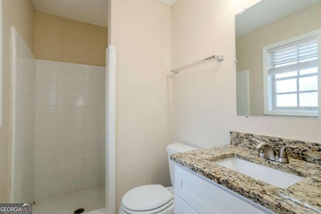 2236 Chestnut Hill Cir, Decatur, GA 30032 - bathroom with tiled shower, vanity, and toilet