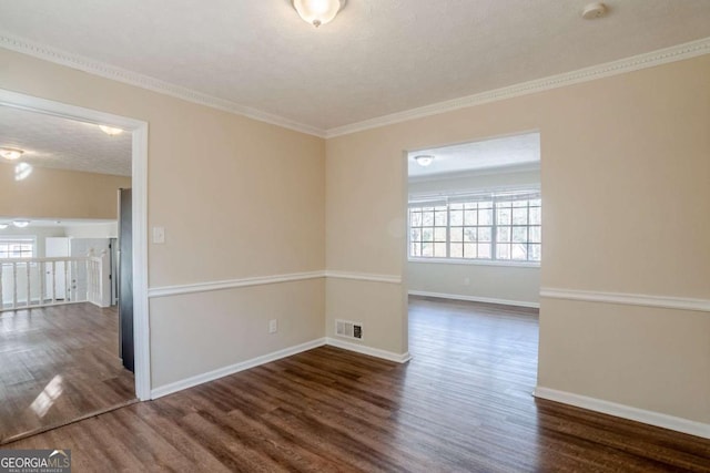 2236 Chestnut Hill Cir, Decatur, GA 30032 - spare room featuring a textured ceiling, dark wood finished floors, visible vents, and baseboards