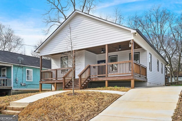 view of front of home featuring crawl space, ceiling fan, and a porch